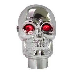 PERILLA CROMADA DE CALAVERA CON LUZ EN OJOS ROJO.